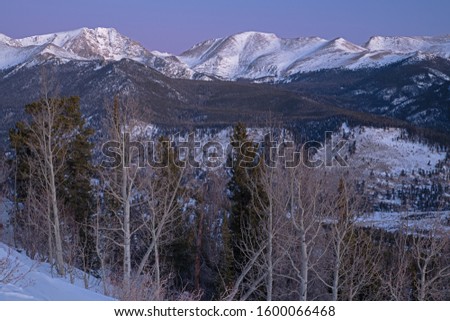 Winter landscape at dawn of the Front Range of the Rocky Mountains from Rocky Mountain National Park, Colorado, USA