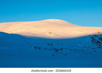 Winter landscape in Dovrefjell National Park, south Norway. - Shutterstock ID 2256064143