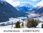 Winter landscape of the Engadine valley in a sunny morning,  Guarda, Lower Engadine, Graubunden, Switzerland.