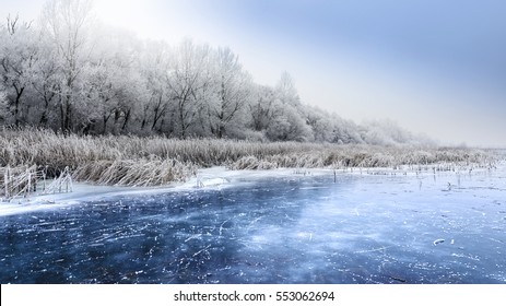 Winter Landscape With Frozen Pond.