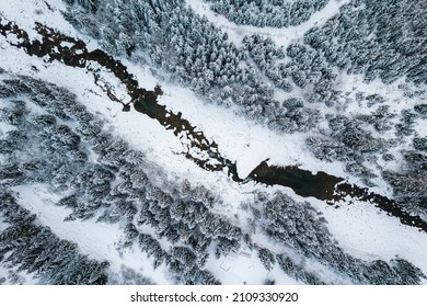 Winter Landscape With Frozen River. Top Down Drone View.