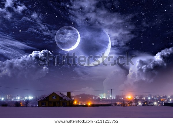 Winter landscape, a house on a\
hill, night city lights and a fantastic space with a double\
moon