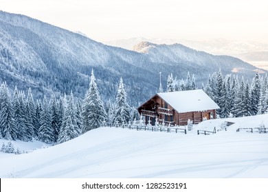 Winter Landscape With A Hut In The Bucegi Mountains,  Romania. 