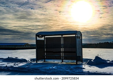 Winter Landscape With The Image Of Bus Station At Sunset