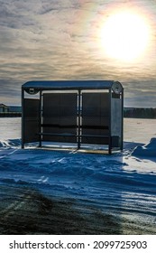 Winter Landscape With The Image Of Bus Station At Sunset