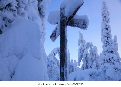 Winter Landscape In Lapland North Of Polar Circle, Snow Miracle In The Polar Winter Forest - Hiking Trail Crossing A Snow Mobile Trail, PyhÃ¤-Luosto National Park Near Of SodankylÃ¤, Finland