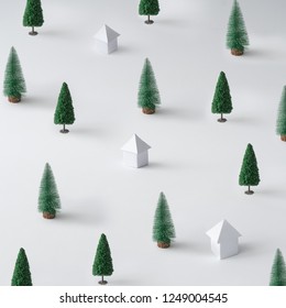 Winter Landscape Made Of Christmas Trees And Paper Houses. Minimal New Year Nature Background.