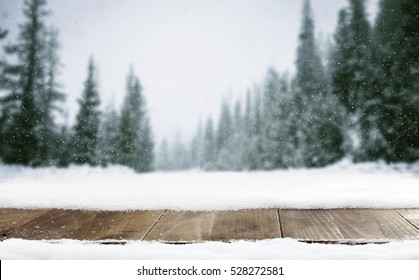 Winter Landscape Of Mountains And Wooden Old Table With Snow