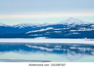 Winter Landscape In Northern Canada With Snow Capped Mountains. 