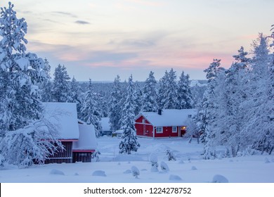 Winter Landscape Scenery In Lapland, Scandinavia With Snow And Traditional Houses