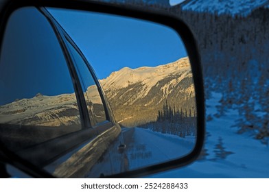 Winter landscape seen through a car mirror - Powered by Shutterstock