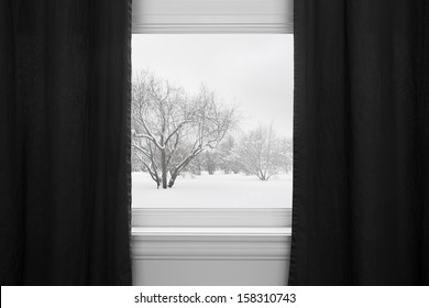 Winter Landscape Seen Through The Window With Black Curtains.