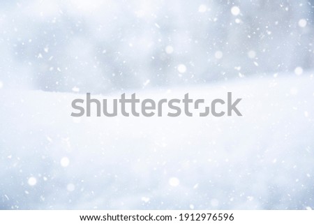 Winter landscape. It's snowy. Snowflakes, drifts of snow. At close range. Snowfall. Nature. Recording space, free space. Background.