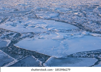 Winter Landscape At Sunrise Of Ice Formations On Lake Michigan, Grand Haven, Michigan, USA