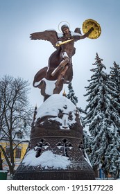 Winter landscape view of the bronze sculpture of the Archangel Michael in Kiev on Vladimirskaya mountain