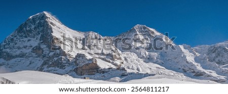Winter landscape with views of Eiger peak and monch peak. Grindelwald Switzerland