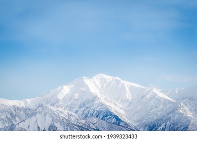 Winter landscape views is snow covered the high peak of Yuzawa City, Minamiuonuma District, Niigata, Japan. - Powered by Shutterstock