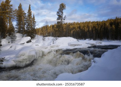 Winter landscape with a waterfall and snow. Russia, Karelia - Powered by Shutterstock