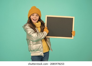 Winter Leisure. Smiling Girl Wear Winter Outfit Show Blank Chalkboard Copy Space. Winter Event. Informing Kids Community. For More Information, You Can Find All Details Here. Important Announcement