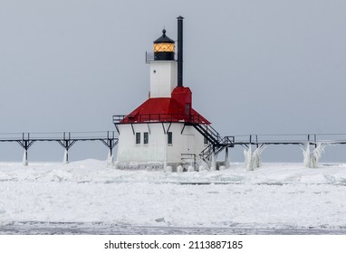 Winter Lighthouse Along Frozen Lake Michigan 