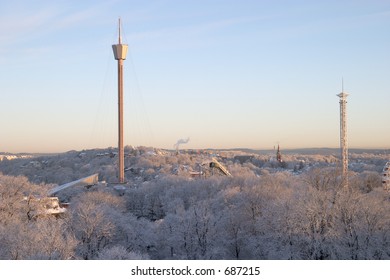 Winter morning: colourful, beautiful panorama sunrise with snow and buildings, Liseberg tower, downtown G?teborg, Sweden
