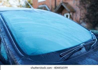 Winter Morning With Ice On Car Windshield