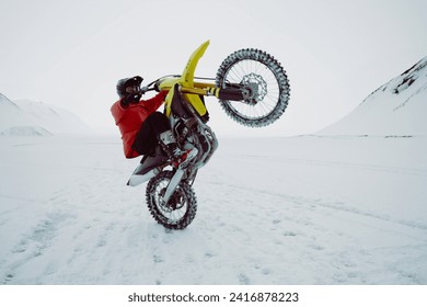 Winter motocross. Racers ride on ice. Winter sports. - Powered by Shutterstock