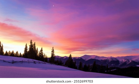 Winter mountain landscape at sunrise or sunset, snow-covered hillside, vibrant skies in pink, purple, orange, and a crescent moon visible with silhouetted trees and peaks - Powered by Shutterstock