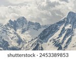 Winter mountains beautiful alpine panoramic. Aerial drone view of  French Alps Mountains glacier near Grenoble. Europe alps in winter. Les deux alpes resort. Mountains aerial snow winter view.