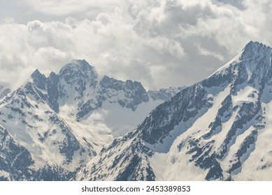 Winter mountains beautiful alpine panoramic. Aerial drone view of  French Alps Mountains glacier near Grenoble. Europe alps in winter. Les deux alpes resort. Mountains aerial snow winter view. - Powered by Shutterstock
