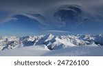 Winter mountains with magic clouds
