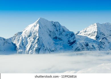 Winter mountains - ski slopes in Italian Alps - Shutterstock ID 119926816