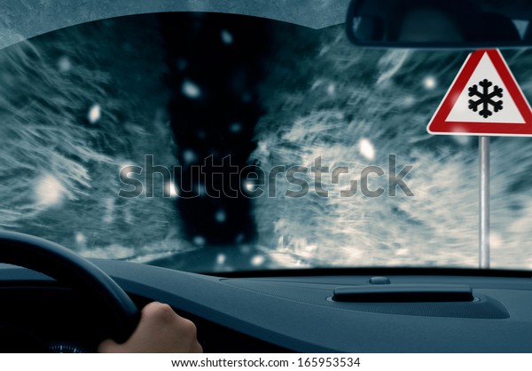 winter night\
driving - snowfall on a country\
road