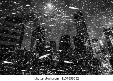 Winter In NYC. Black And White Image Of The Snowstorm Night In New York City. Illumination And Night Lights. 