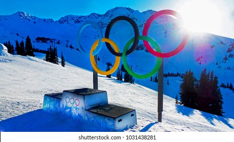 Winter Olympic Games - The Olympic Rings And The Stage For Winners On The Top Of Snowy Blackcomb Mountain In Whistler, BC On January 9, 2018