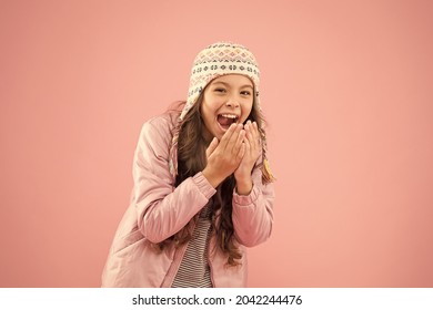 Winter Outfit. Shopping For Accessories. Cute Smiling Model. Adorable Small Child Wear Winter Knitted Accessory. Cute Little Girl Fashion Hat Pink Background. Clothes Shop. Hats For Winter Season