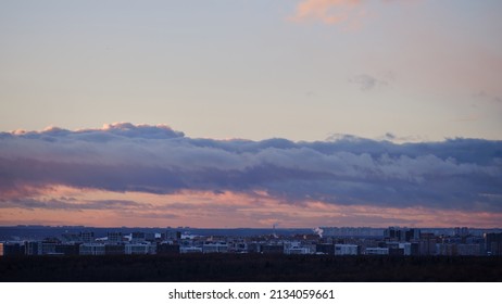 Winter Over The City With Houses In The Snow And Smoke From The Pipes, Timelapse