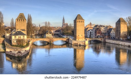 Winter Panorama Of The Famous Bridges Ponts Couverts In Strasbourg, France.