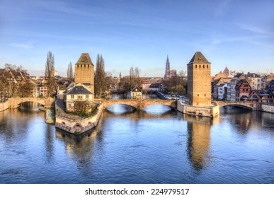 Winter Panorama Of The Famous Bridges Ponts Couverts In Strasbourg, France.