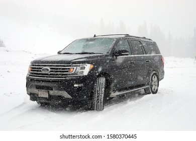 WINTER PARK, COLORADO - DECEMBER 5, 2019: 2018 Ford Expedition Max Under Snowfall