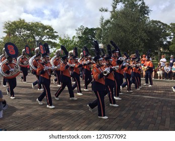 Winter Park, Florida - Dec 28, 2018: Syracuse Orange Marching Band Plays Down Park Avenue In The Battle Of The Bands Prior To Their 2018 Bowl Game Appearance