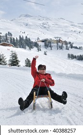 Winter People Series - Senior Woman On Sledge Having Fun In White Snowy Landscape