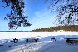 Winter Picnic. Barbeque Spot In Nature With Wooden Benches. Snow Covered Area. Järfälla, Stockholm, Sweden, Scandinavia, Europe.