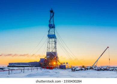 Winter Polar Day In The Arctic. Drilling A Well At A Northern Oil And Gas Field. Low Sun. Beautiful Lighting.