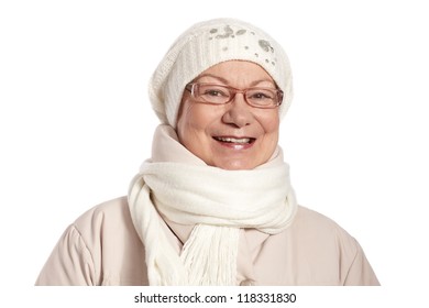 Winter Portrait Of Smiling Mature Woman In Warm Clothes.