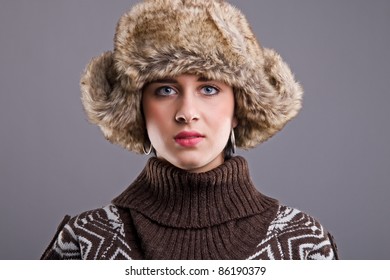 winter portrait of young woman with hat - Shutterstock ID 86190379