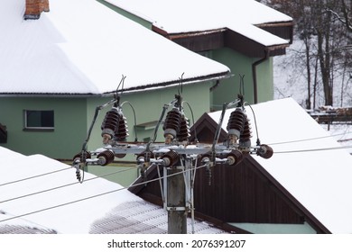 Winter Power Pole Under Snow