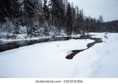 Winter river in forest
