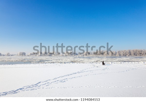 Winter River Lonely Fisherman Floating Ice Stock Photo Edit Now 1194084553