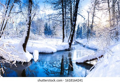 Winter River In Snow Forest Landscape. Frozen River Water In Winter